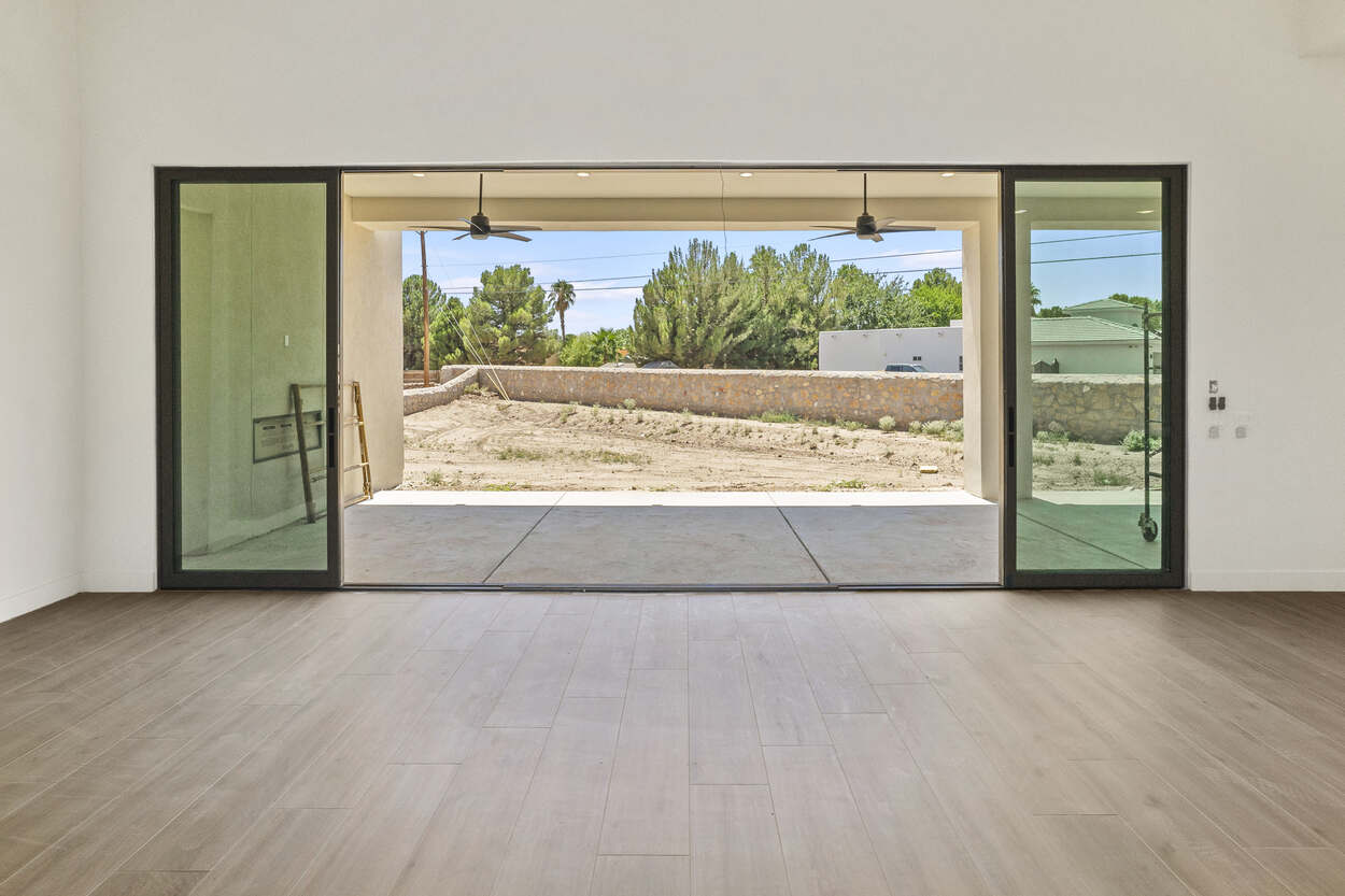 633 Bir multi-panel sliding wall open to patio